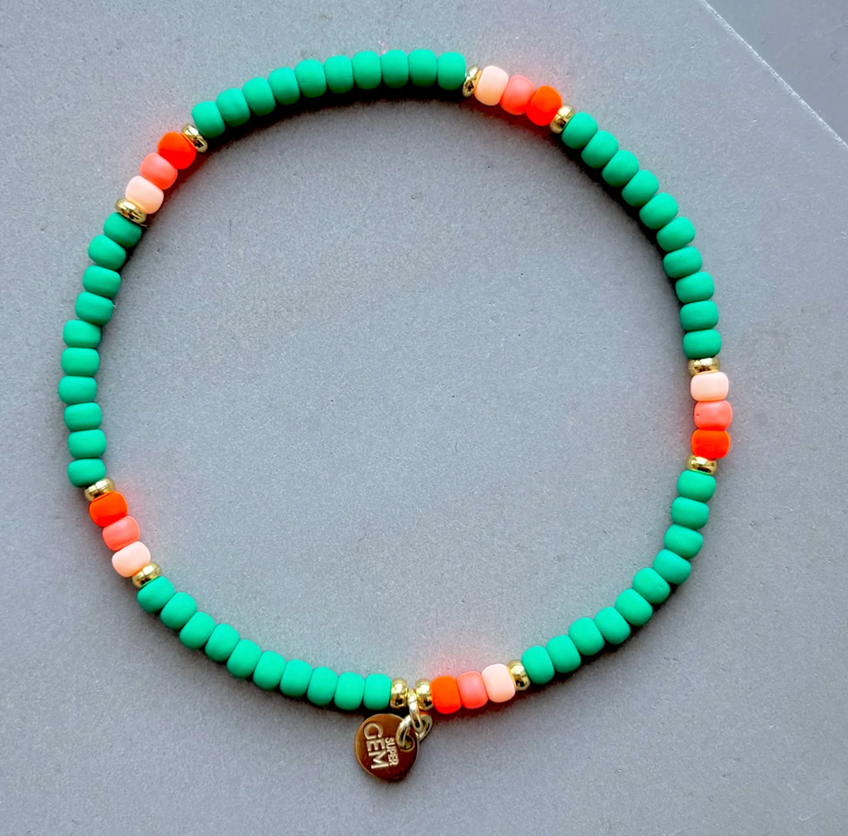 ARMBAND - MINI ROC PEACOCK ORANGE