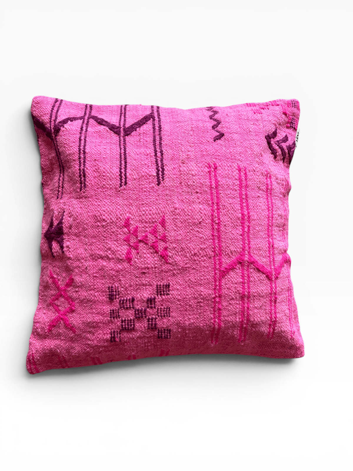 LEY! Kissen – Colorful Line – Pink Edition 60x60: Quadratisches rosa Kissen mit geometrischen Mustern in Lila/Magenta auf weißem Hintergrund.
